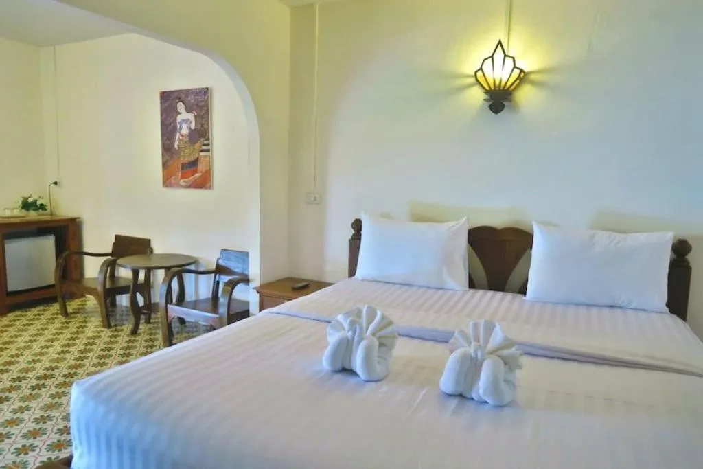 Bed in Nan Lanna Hotel