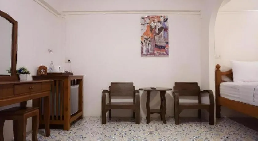 Bed in Nan Lanna Hotel