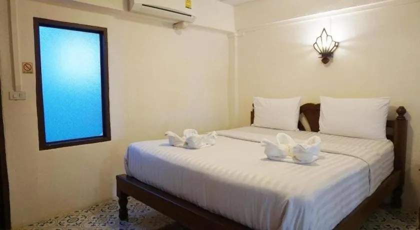 Bed in Nan Lanna Hotel