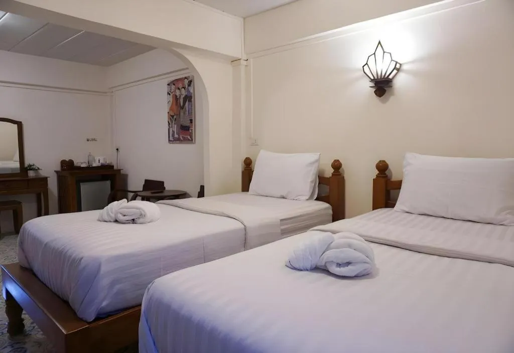 Bed in Nan Lanna Hotel