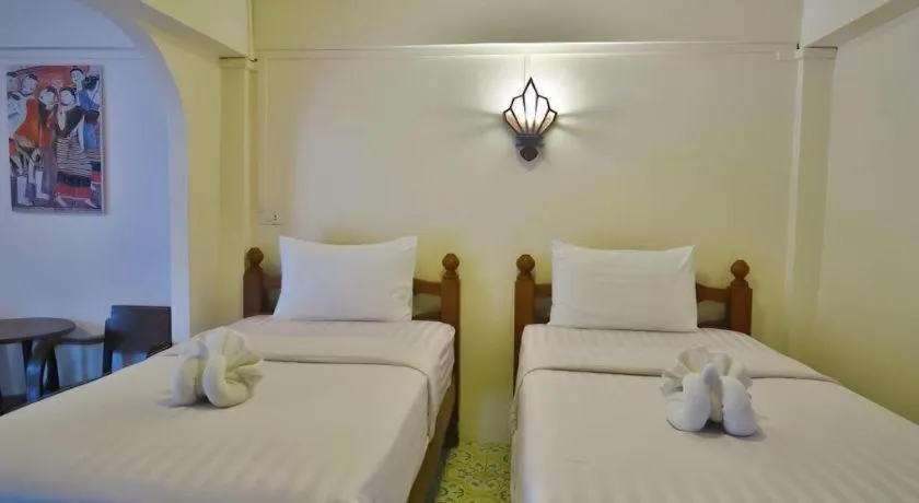 Bed in Nan Lanna Hotel