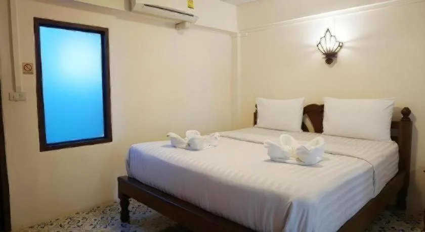 Bed in Nan Lanna Hotel