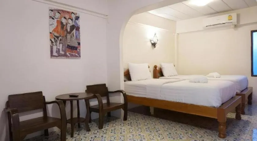 Bed in Nan Lanna Hotel