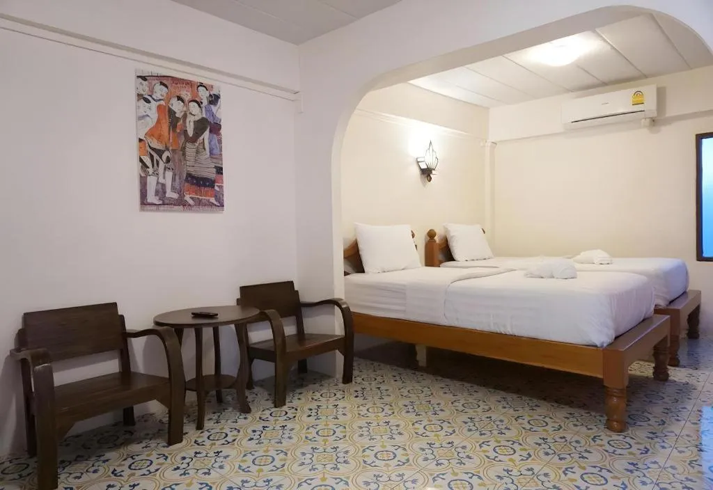 Bed in Nan Lanna Hotel