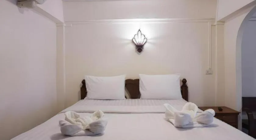 Bed in Nan Lanna Hotel