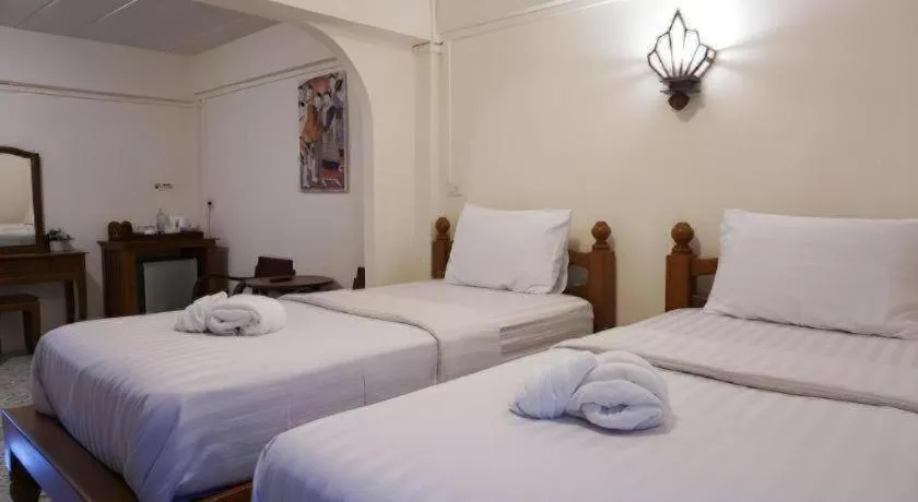 Bed in Nan Lanna Hotel