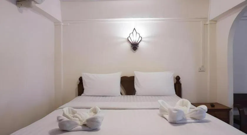 Bed in Nan Lanna Hotel
