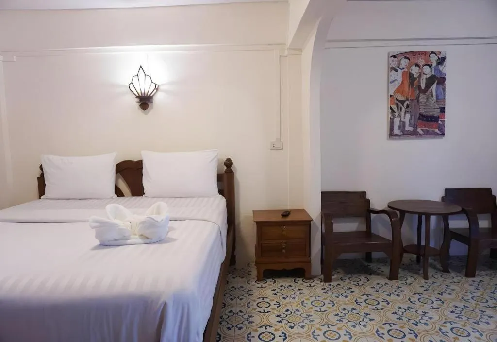 Bed in Nan Lanna Hotel