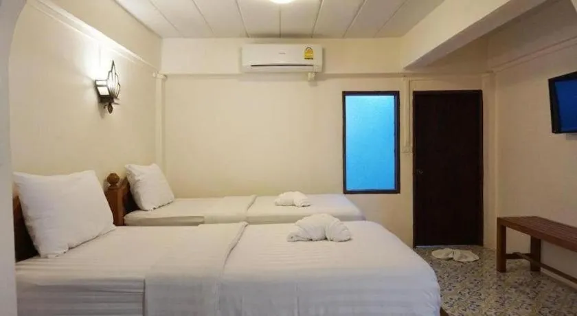 Bed in Nan Lanna Hotel