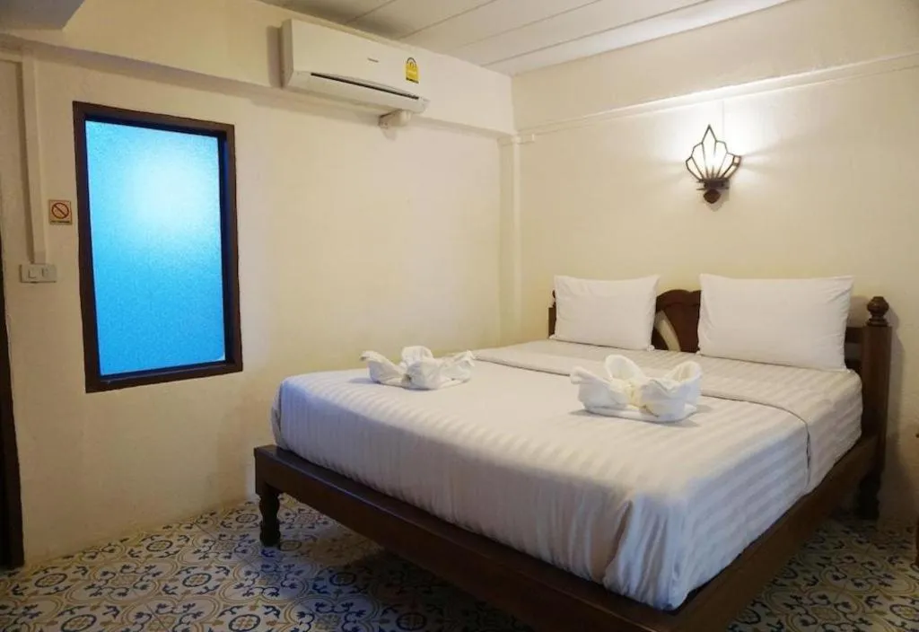 Bed in Nan Lanna Hotel