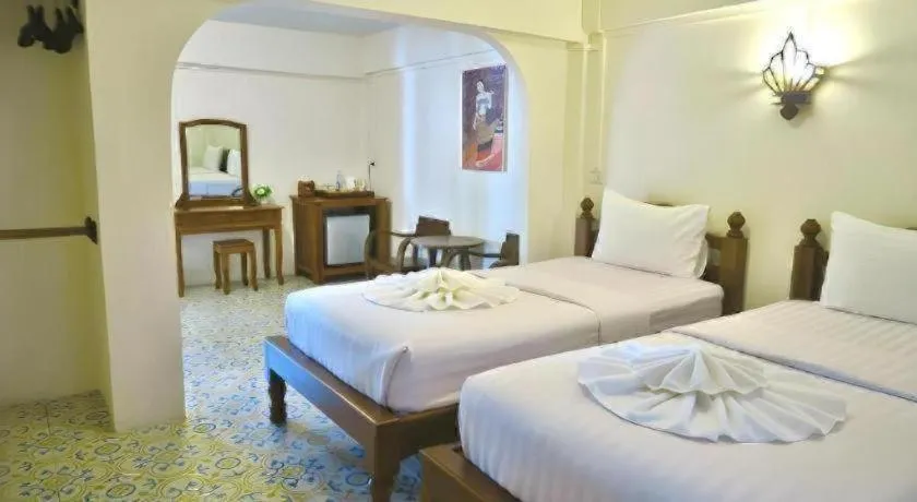 Bed in Nan Lanna Hotel