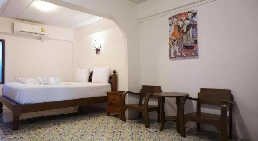 Bed in Nan Lanna Hotel