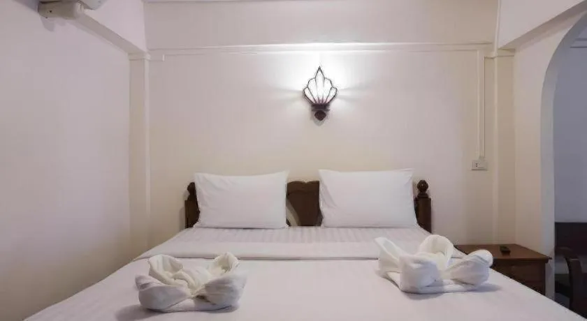 Bed in Nan Lanna Hotel