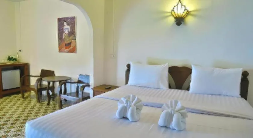 Bed in Nan Lanna Hotel