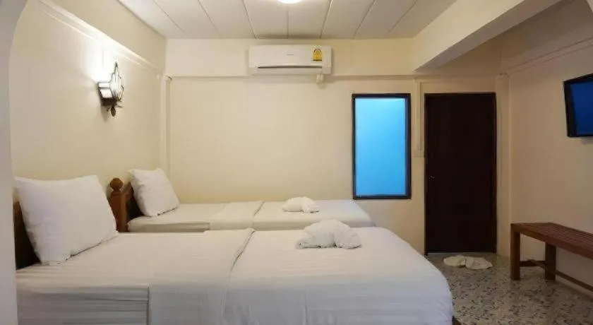 Bed in Nan Lanna Hotel