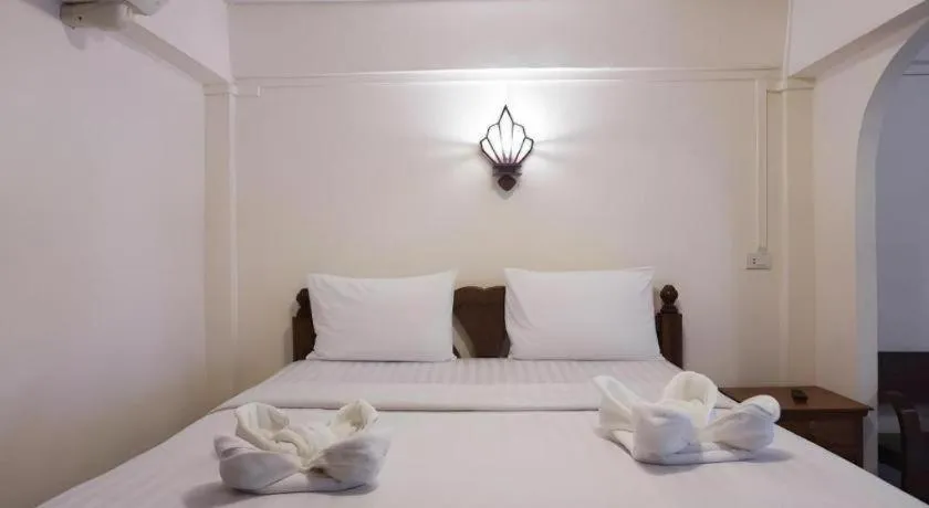 Bed in Nan Lanna Hotel