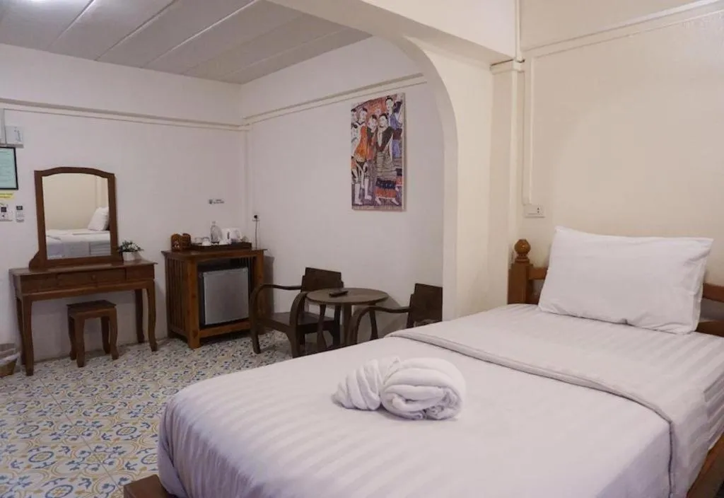 Bed in Nan Lanna Hotel