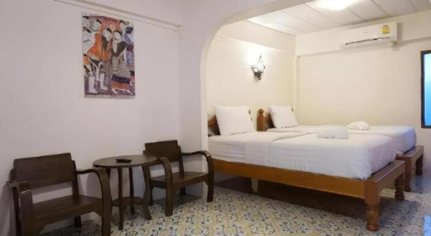 Bed in Nan Lanna Hotel