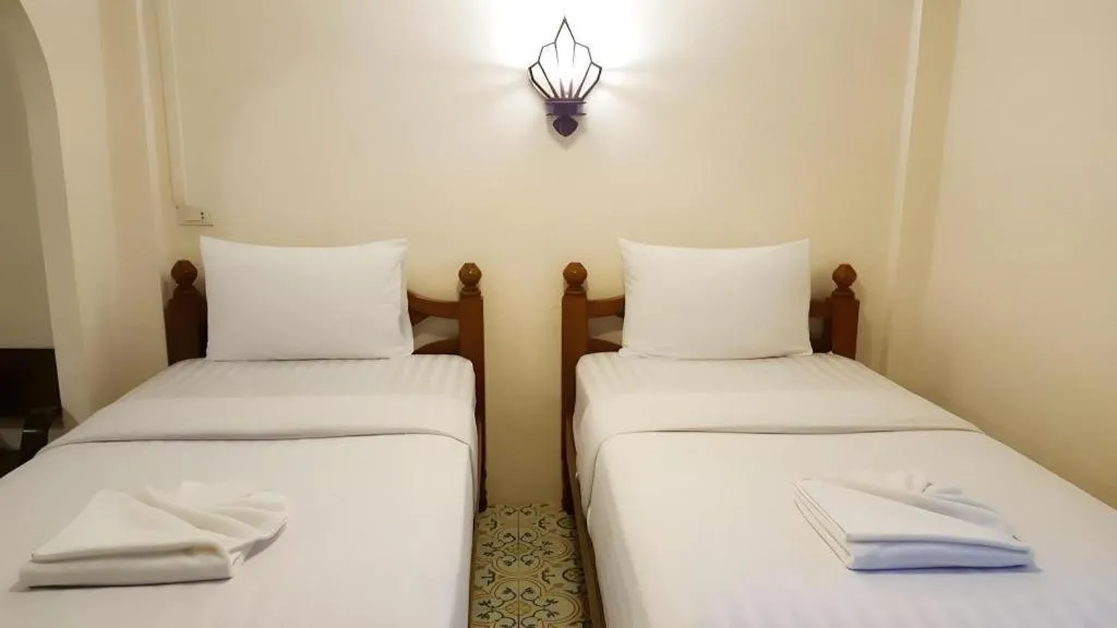 Bed in Nan Lanna Hotel