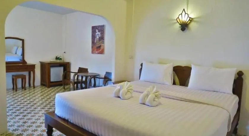 Bed in Nan Lanna Hotel