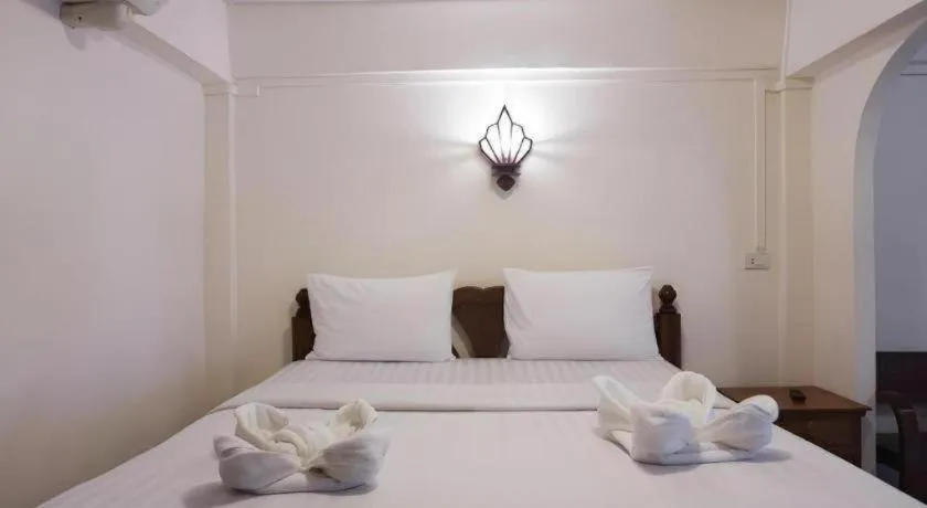 Bed in Nan Lanna Hotel