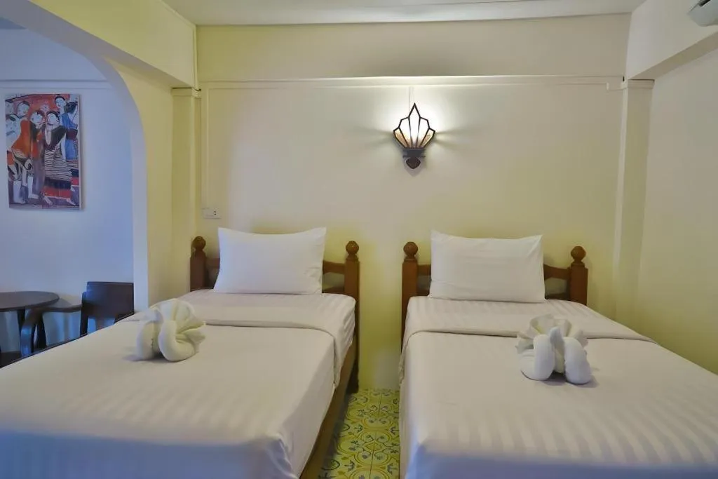 Bed in Nan Lanna Hotel