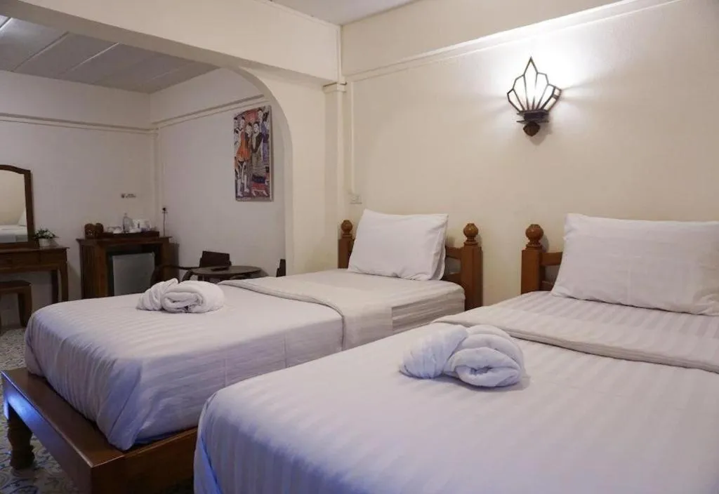 Bed in Nan Lanna Hotel