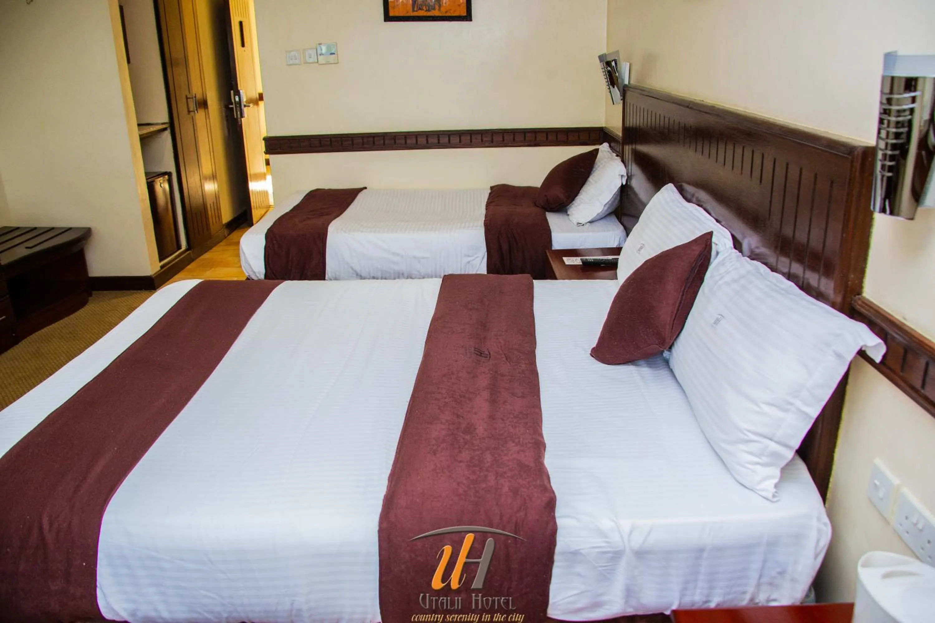 Bed in Utalii Hotel