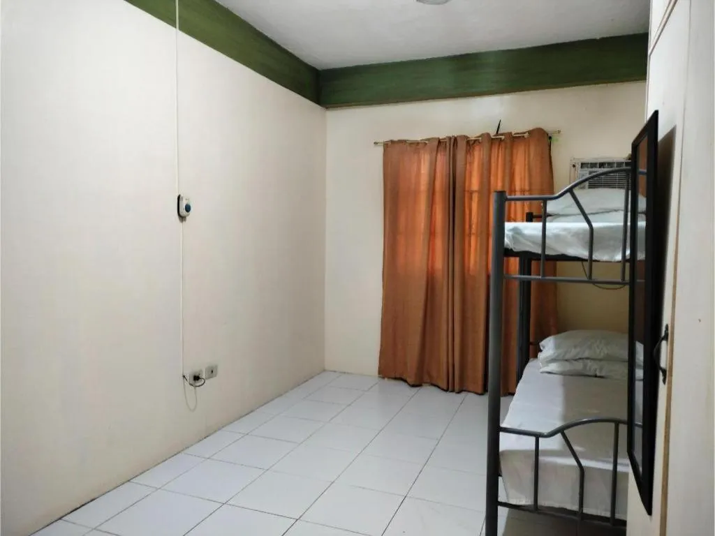 Bed in OYO 800 DDD Habitat Dormtel Bacolod