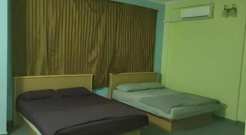 Bed in OYO 90471 Hotel Tepoh