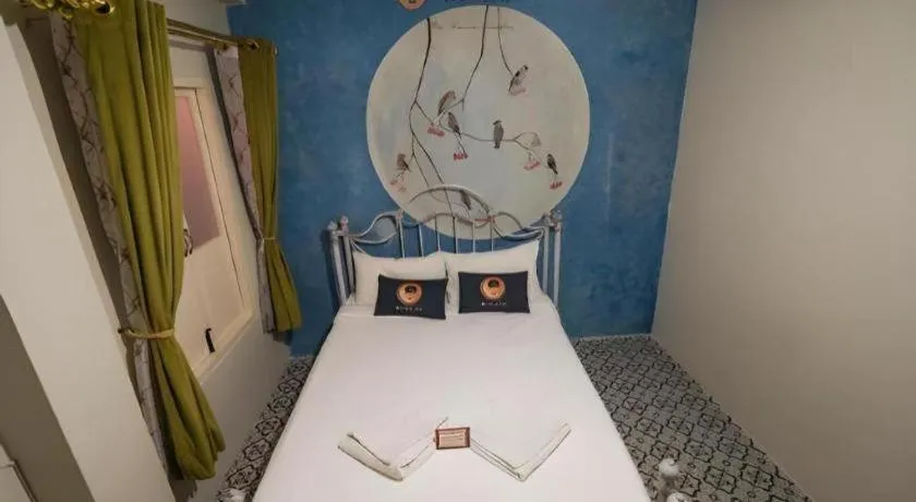 Bed in 2499 Heritage Chinatown Bangkok Hotel By RoomQuest