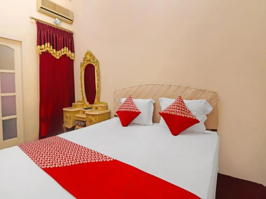 Bed in OYO 2899 Ardilia Bandara Syariah