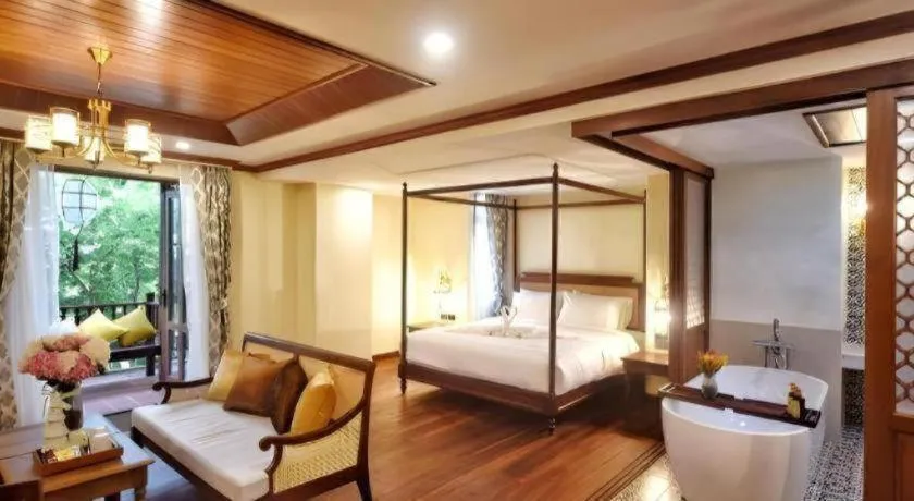 Bed in De Manor Chiang Mai Hotel