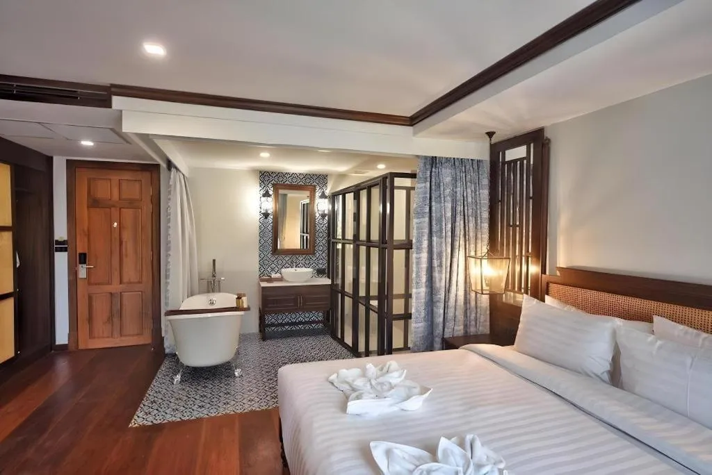 Bed in De Manor Chiang Mai Hotel