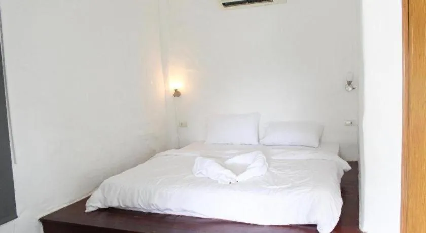 Bed in Capital O 75411 Navagio​ Boutique​ Koh​ Chang