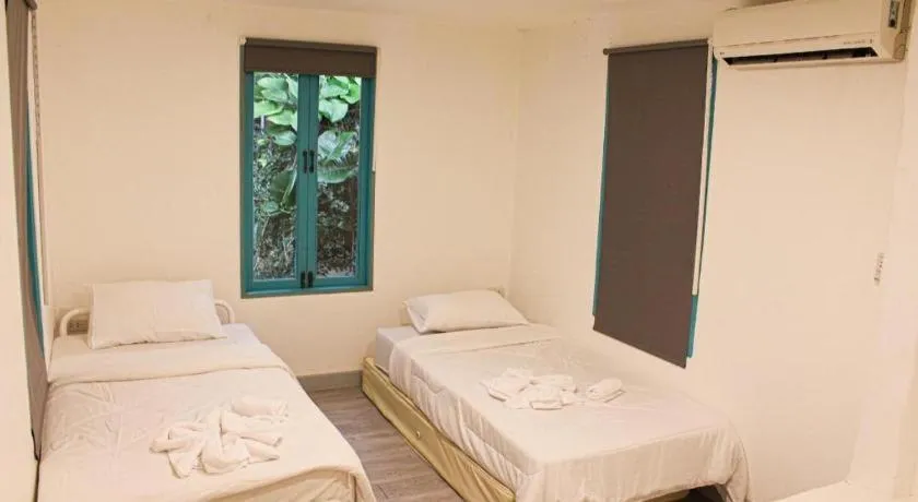 Bed in Capital O 75411 Navagio​ Boutique​ Koh​ Chang