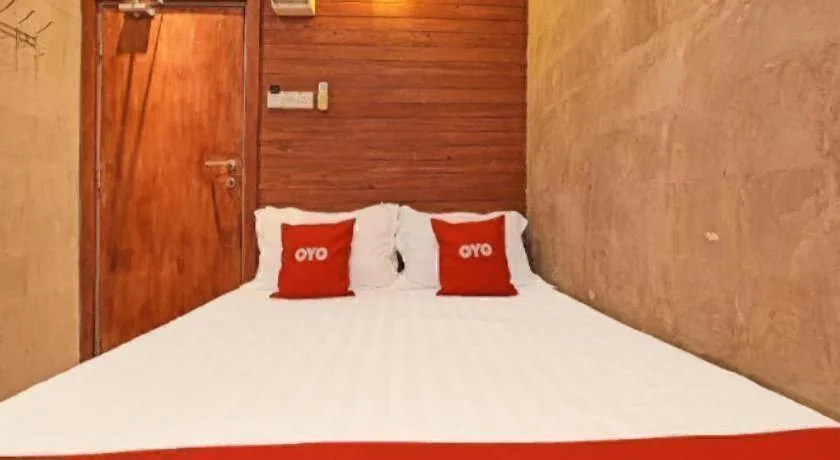 Bed in OYO 90662 The 1975 Hotel