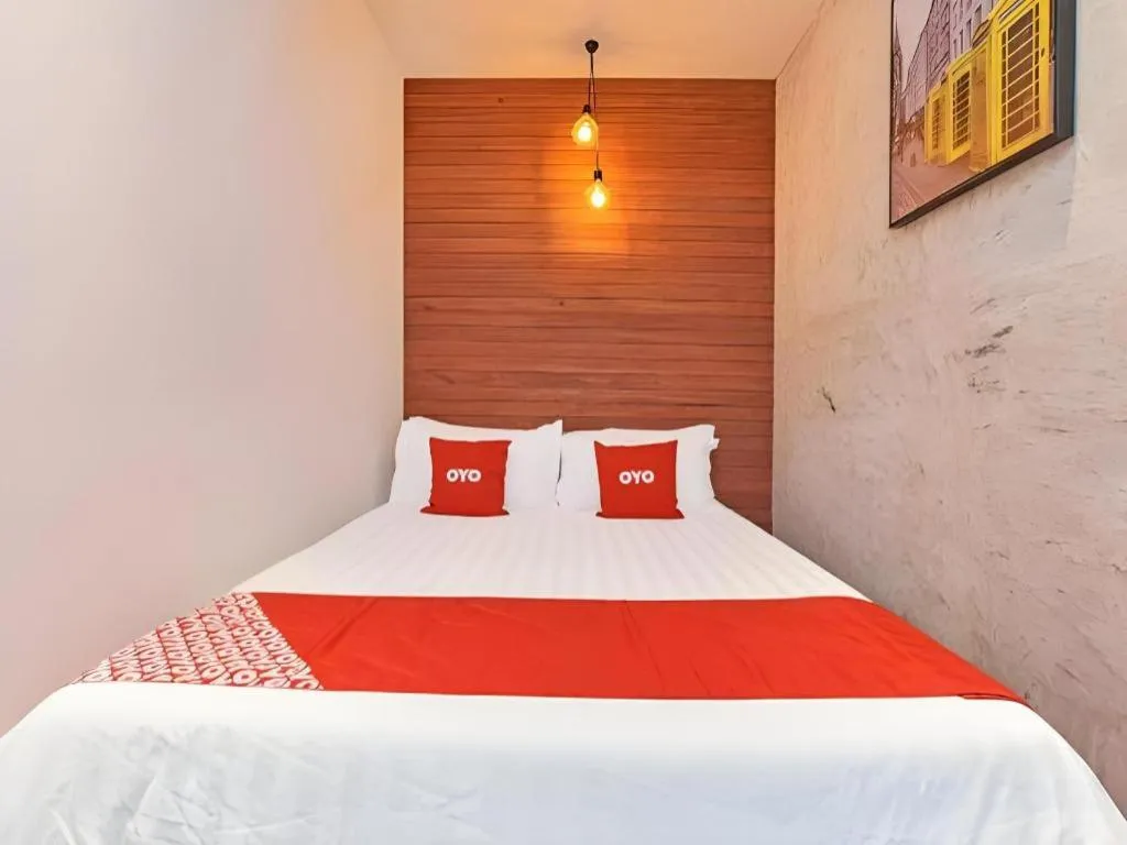 Bed in OYO 90662 The 1975 Hotel
