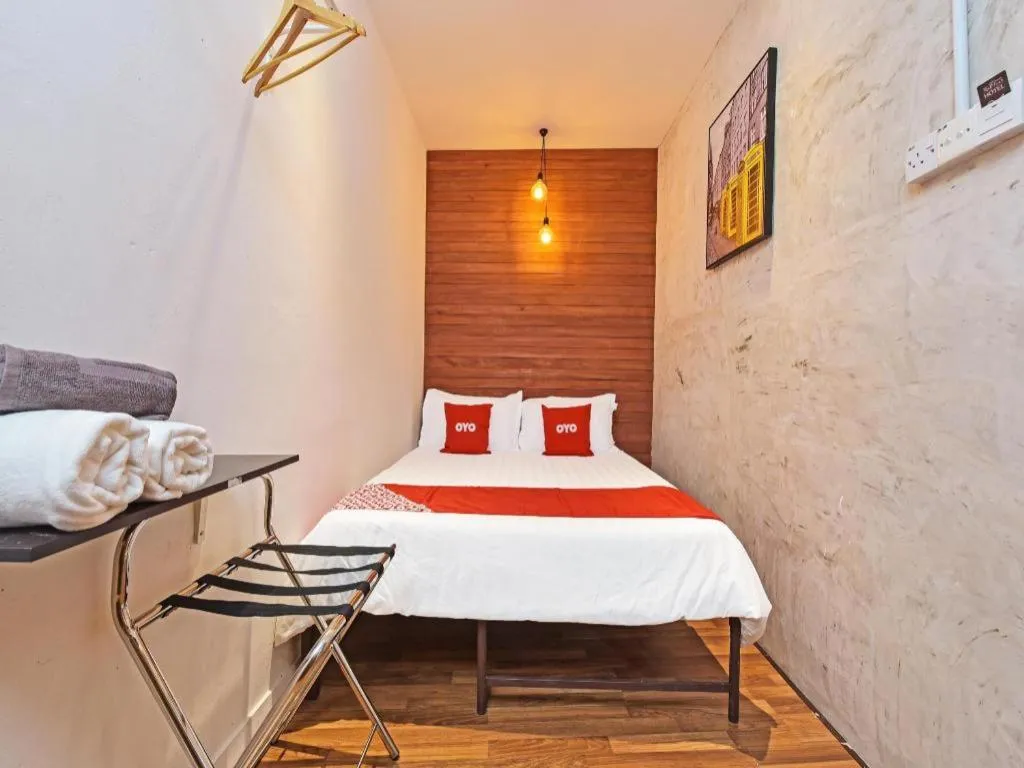 Bed in OYO 90662 The 1975 Hotel