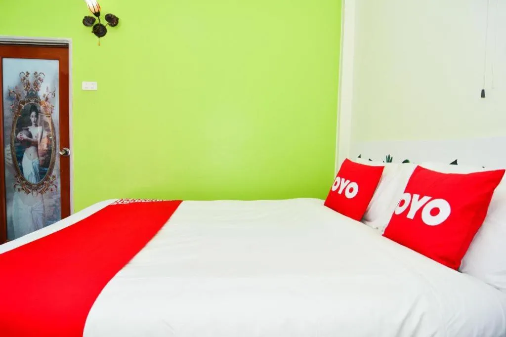 Bed in OYO 499 Pattaraporn Hotel