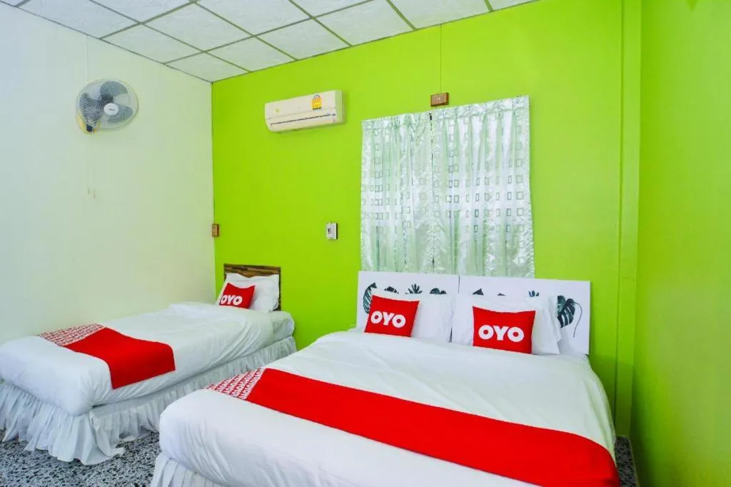 Bed in OYO 499 Pattaraporn Hotel