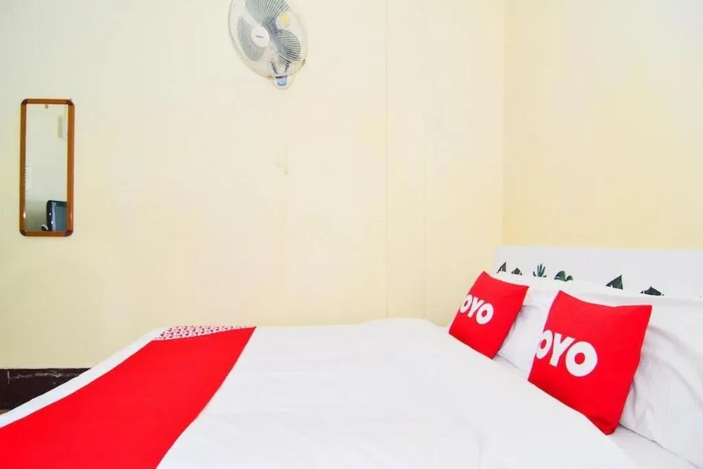 Bed in OYO 499 Pattaraporn Hotel