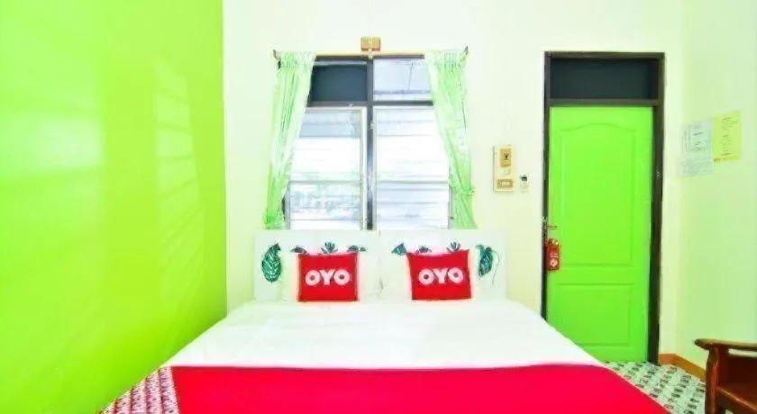 Bed in OYO 499 Pattaraporn Hotel