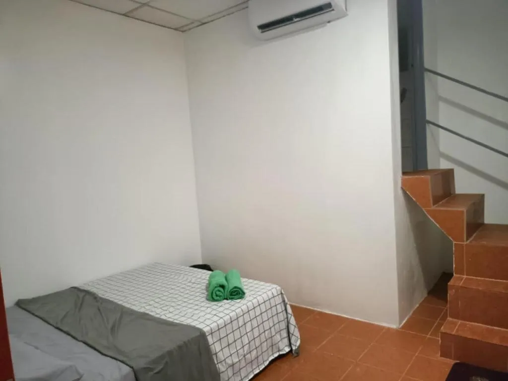 Bed in OYO HOME 90768 Flo Inn Motel