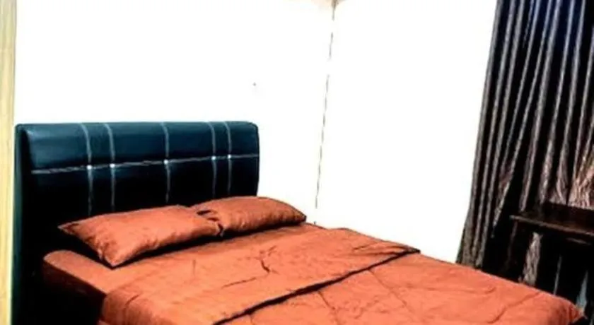 Bed in OYO HOME 90768 Flo Inn Motel