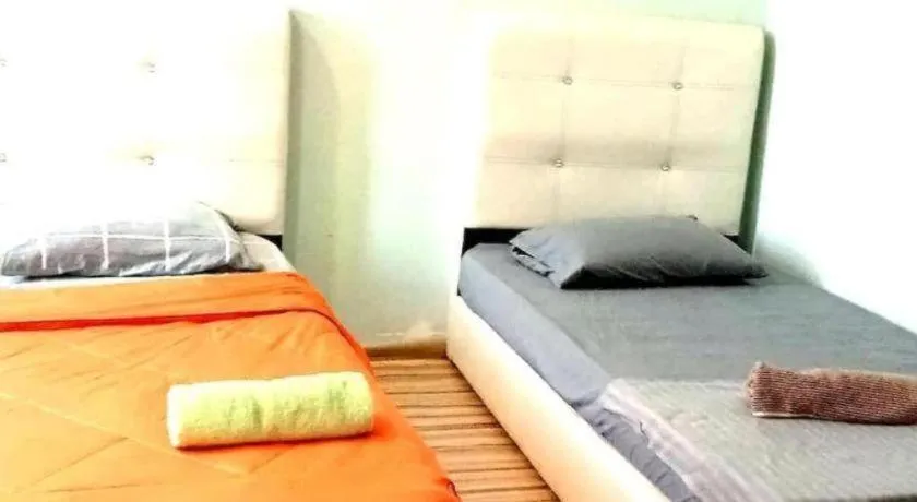 Bed in OYO HOME 90768 Flo Inn Motel