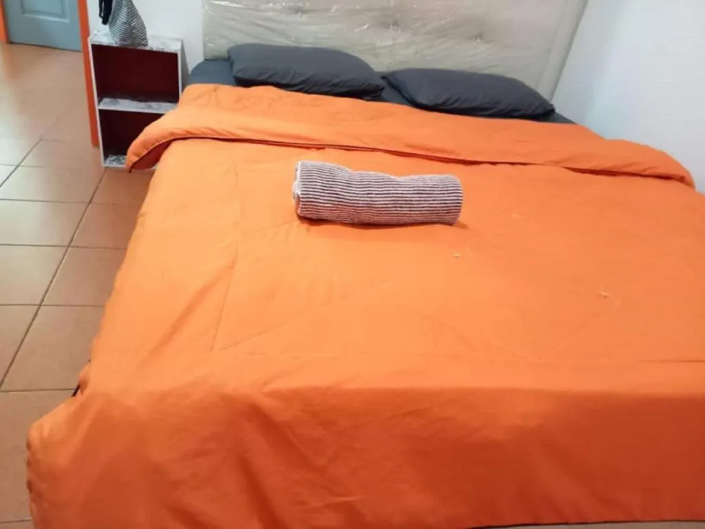 Bed in OYO HOME 90768 Flo Inn Motel