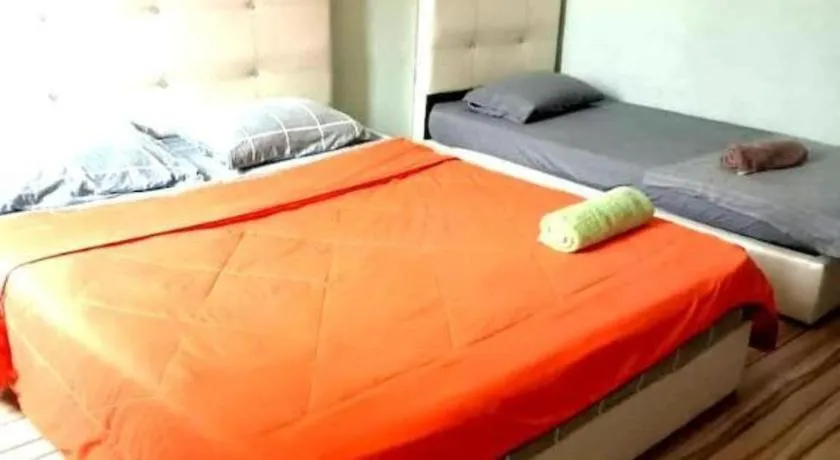 Bed in OYO HOME 90768 Flo Inn Motel