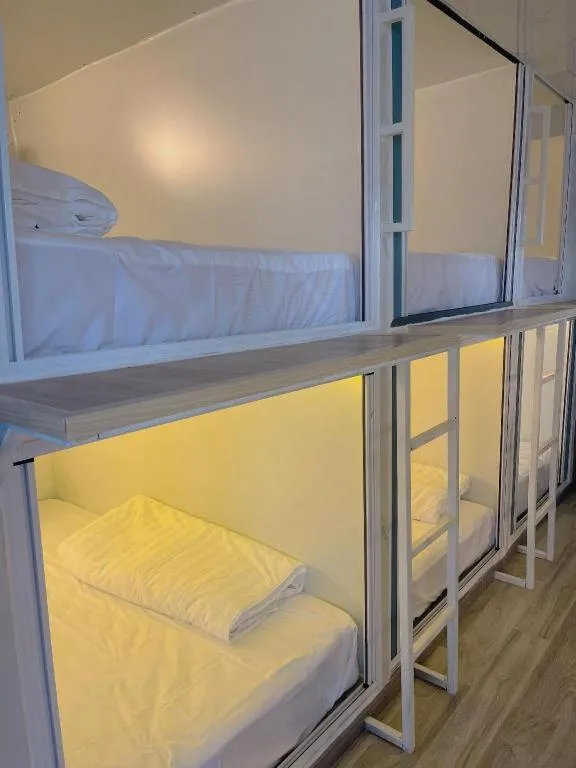 Bed in Heavenchy Hotel