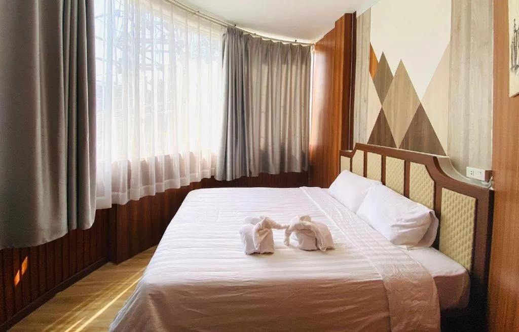 Bed in Heavenchy Hotel